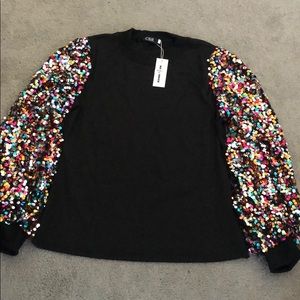 black shirt with glitter sleeves